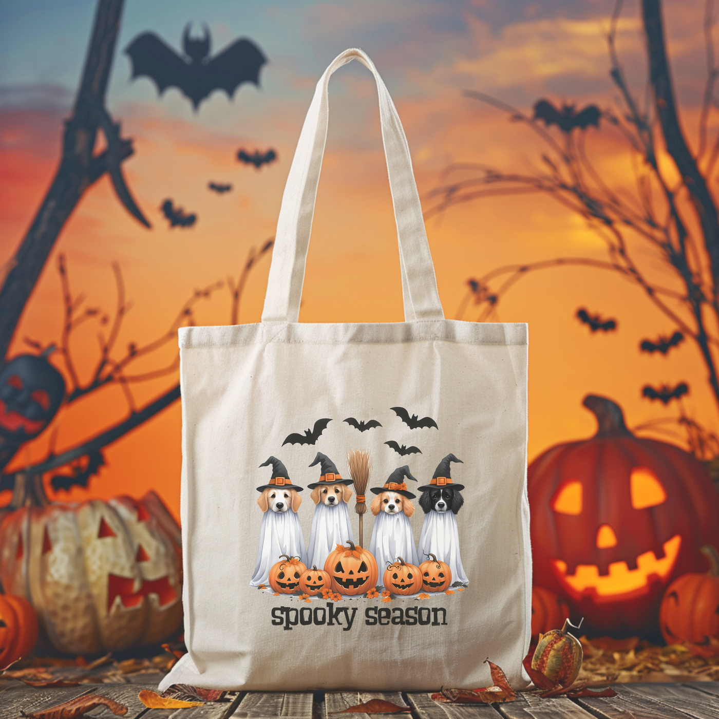 a trick - or - treat bag with three cats on it