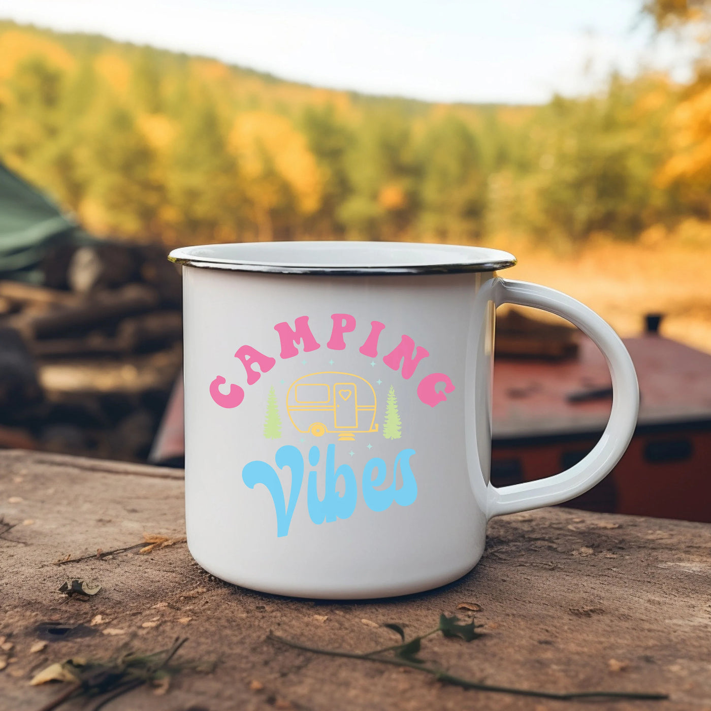 a camper mug sitting on top of a wooden table