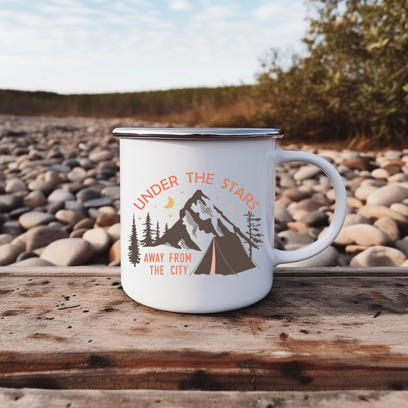 a white coffee mug sitting on top of a wooden table