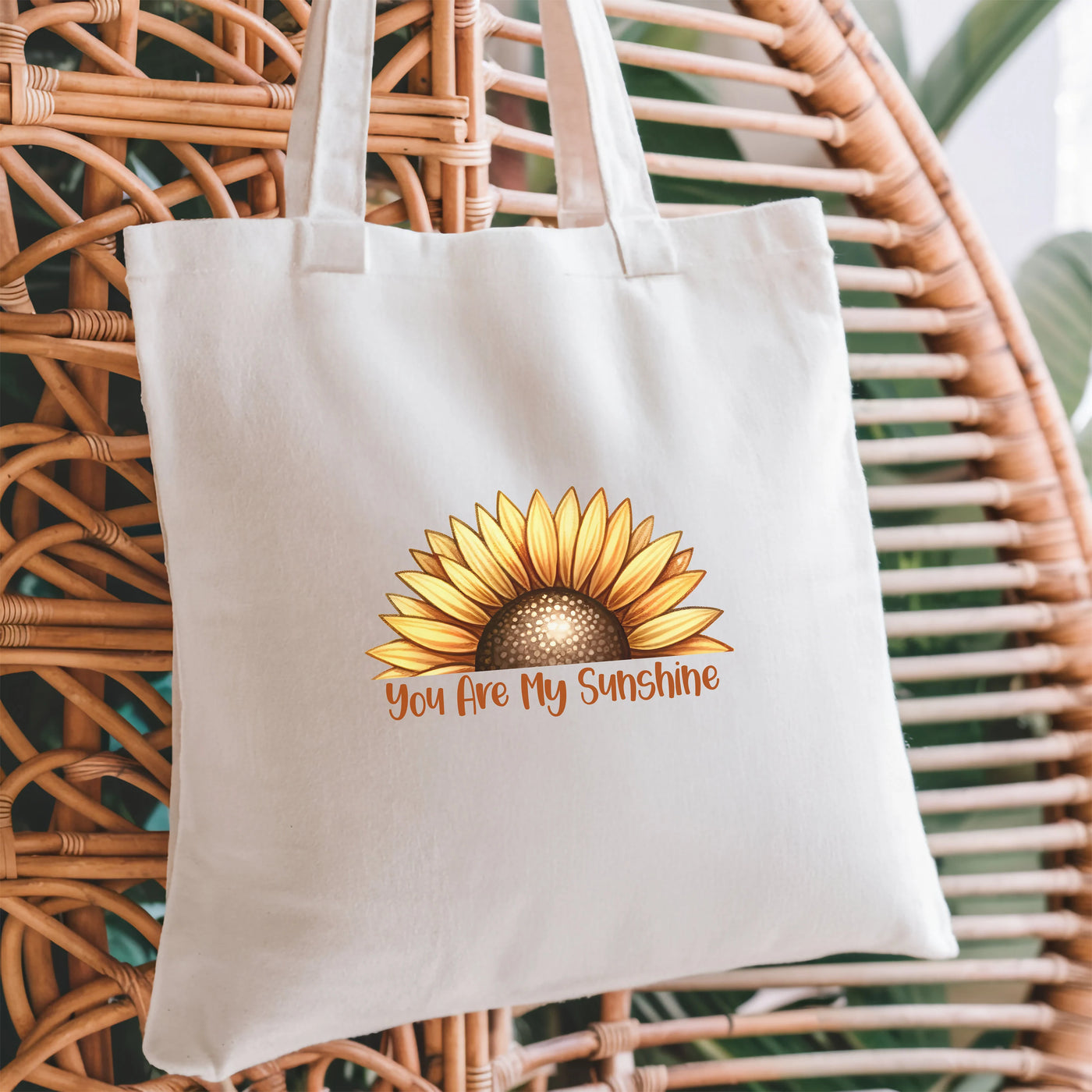 a white bag with a yellow sunflower on it