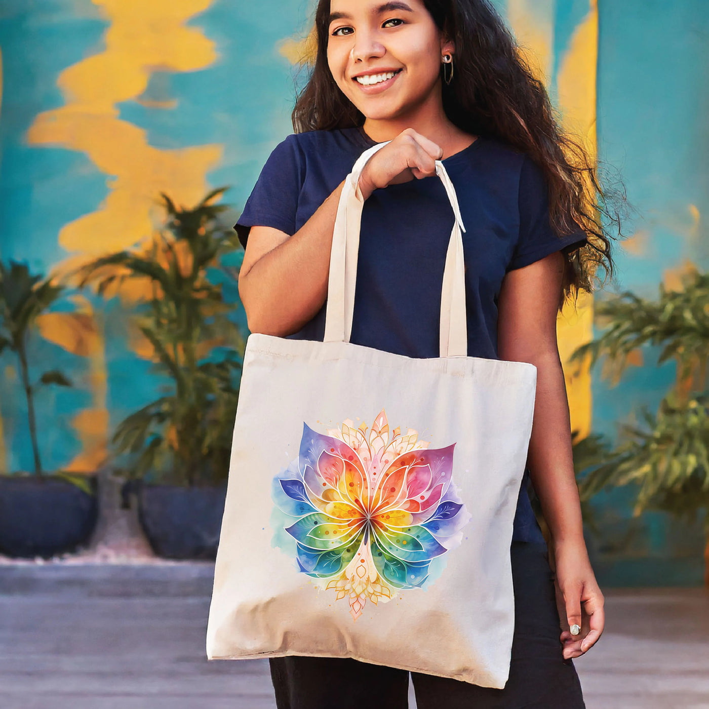 a woman holding a bag with a flower on it