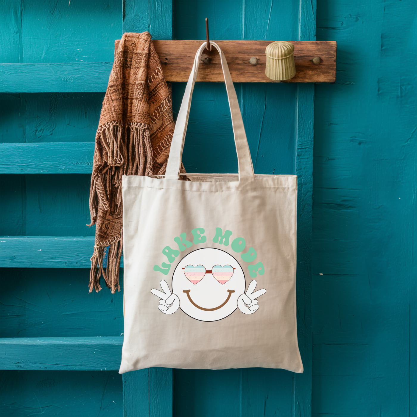 a tote bag hanging on a blue door