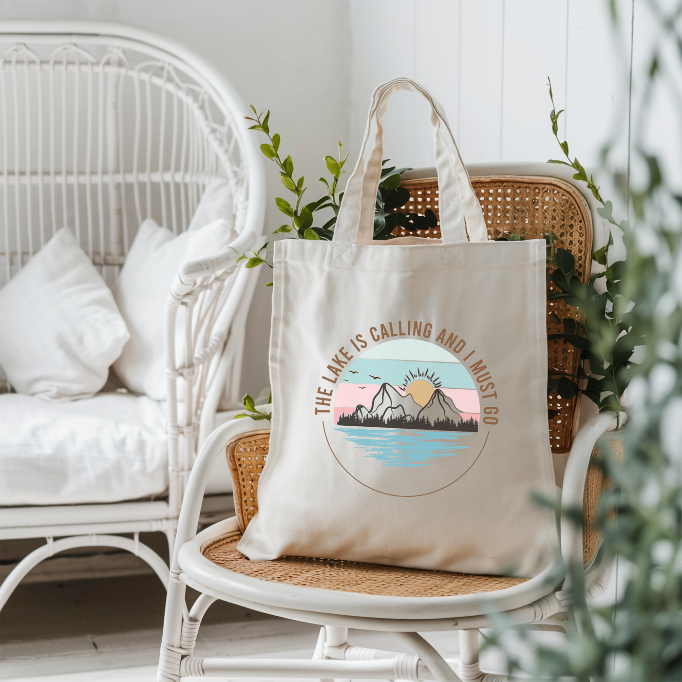 a tote bag sitting on top of a wicker chair