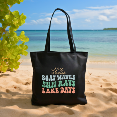 a black bag sitting on top of a sandy beach