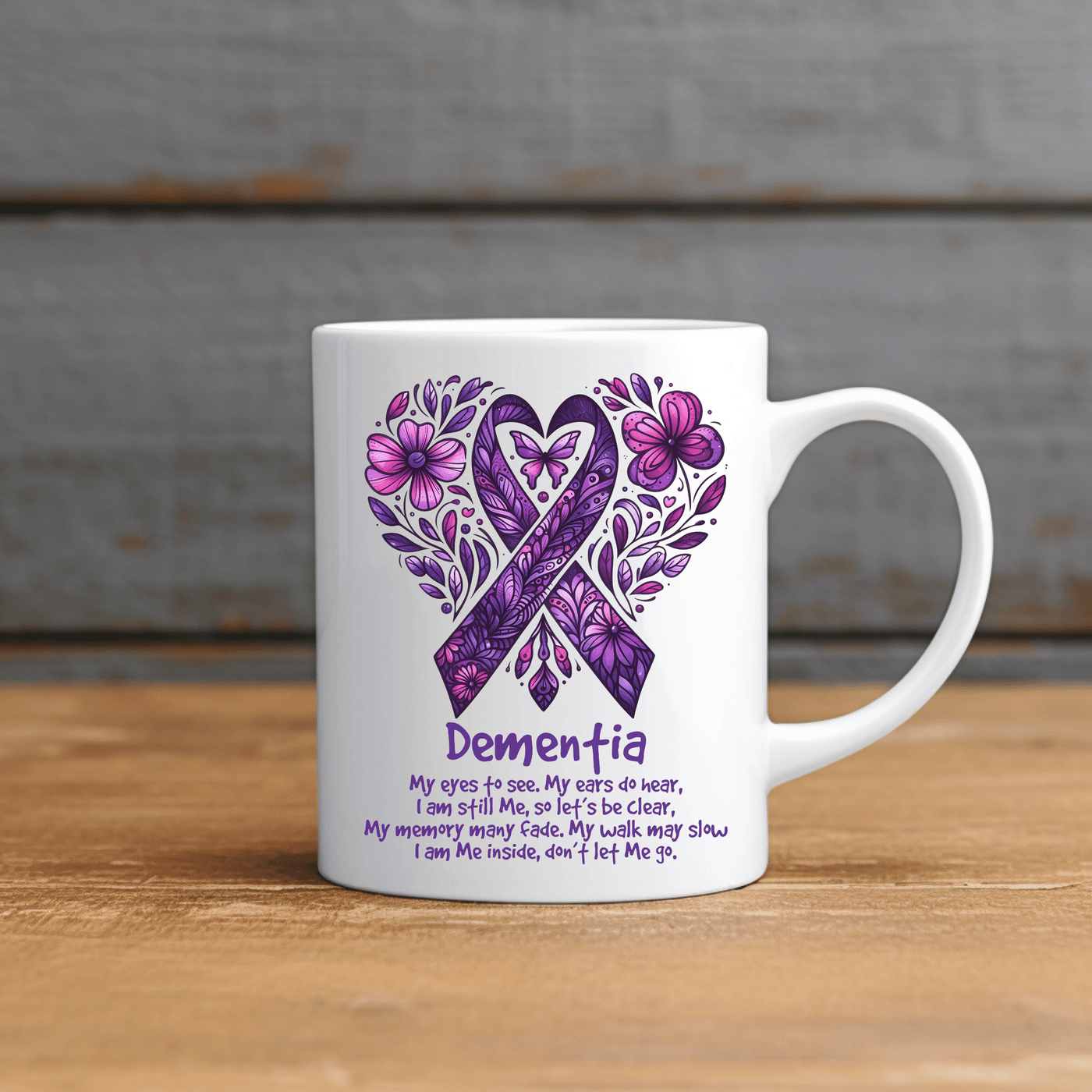 a white coffee mug with a purple ribbon on it