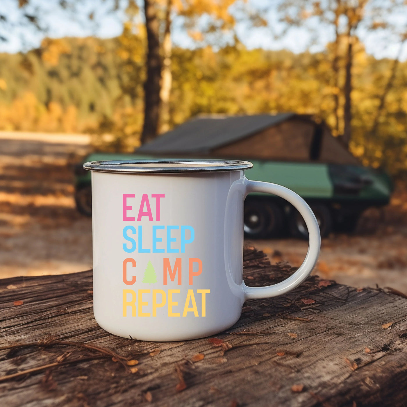 a white coffee mug sitting on top of a wooden table