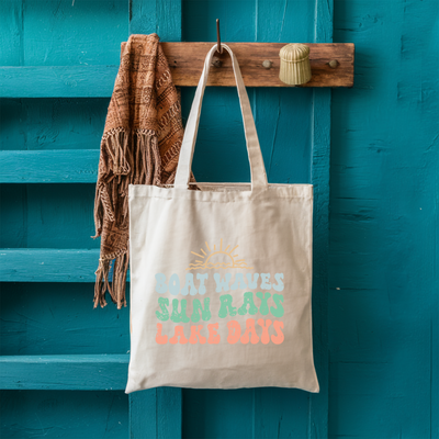 a tote bag hanging on a blue door