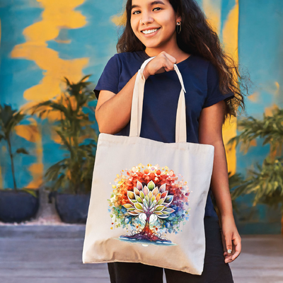 a woman holding a bag with a tree on it