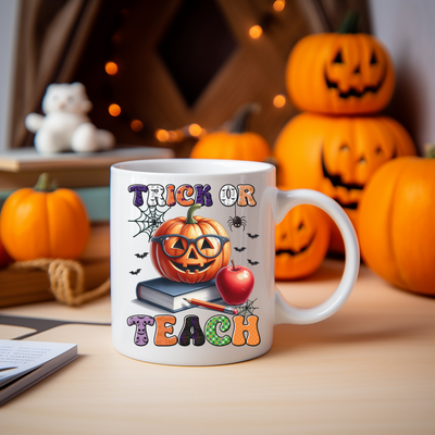 a white coffee mug with a trick or treat on it