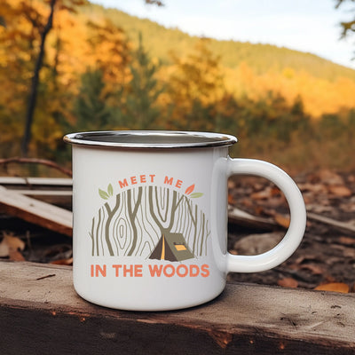 a white coffee mug sitting on top of a wooden table