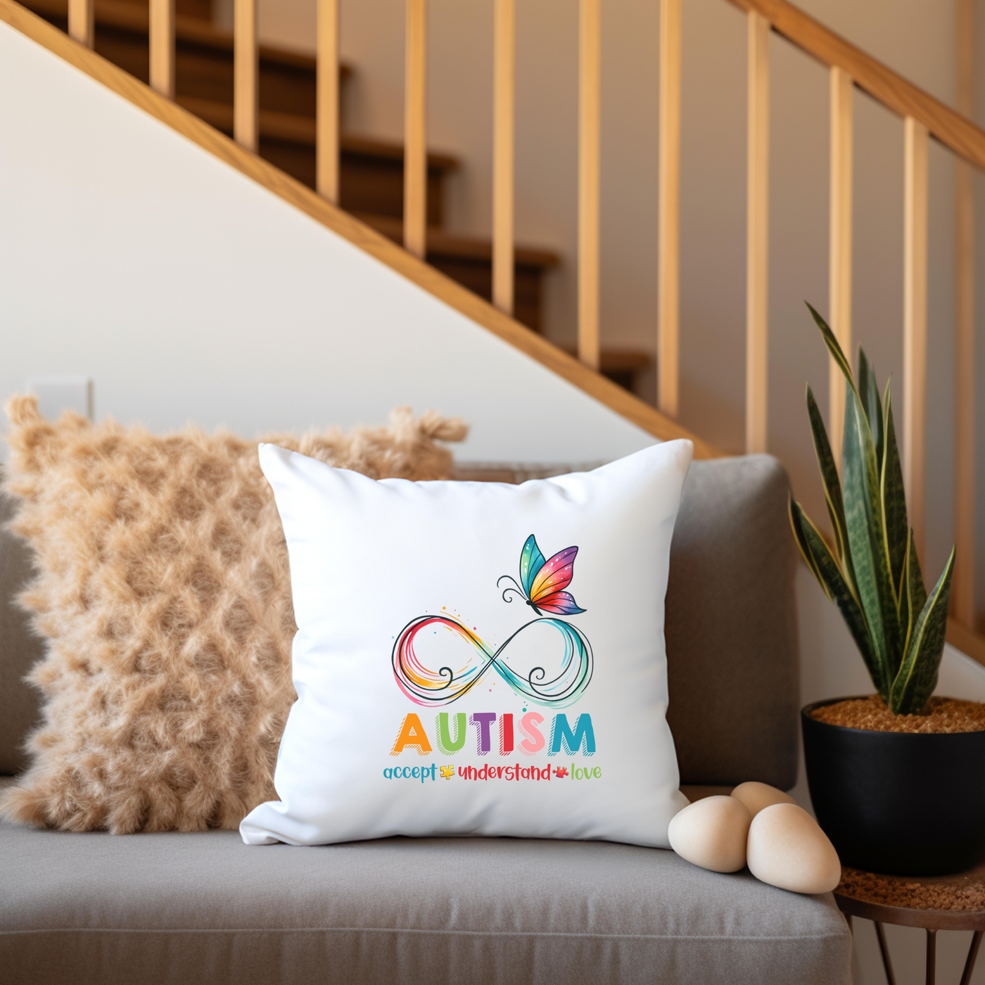 a couch with a pillow and a potted plant