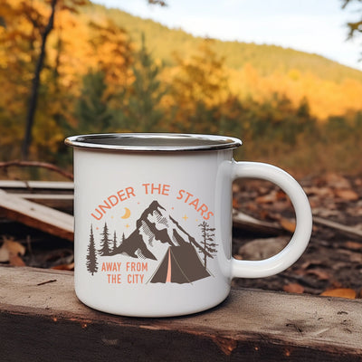 a camp mug sitting on top of a wooden table