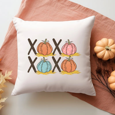 a pillow with a picture of pumpkins on it