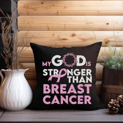 a pillow that says, my god is stronger than breast cancer