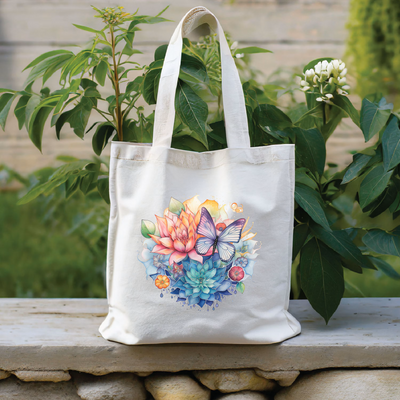 a white tote bag with a picture of flowers and butterflies on it