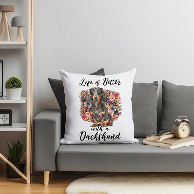 a couch with a pillow that says life is better with a dachshund