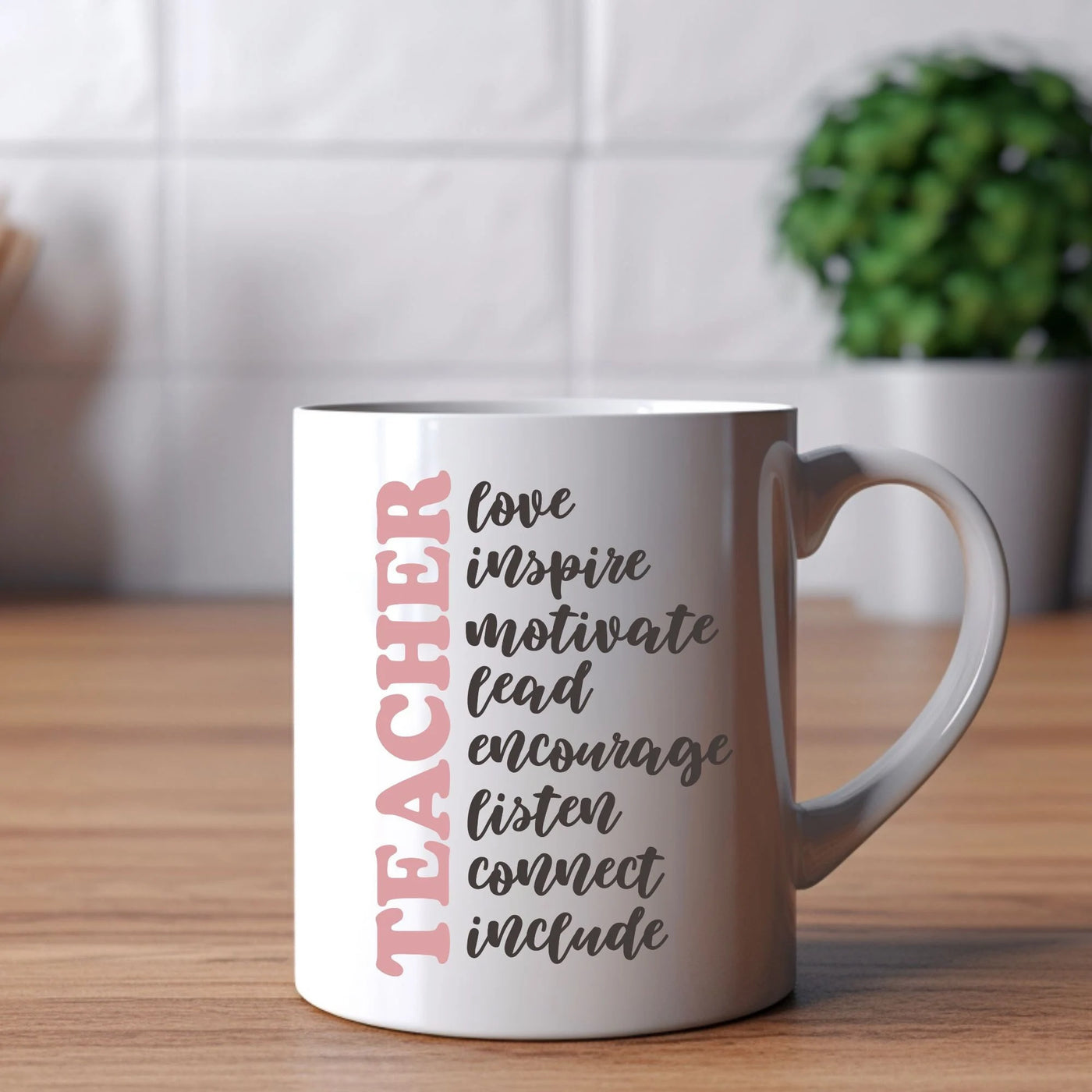 a white coffee mug sitting on top of a wooden table