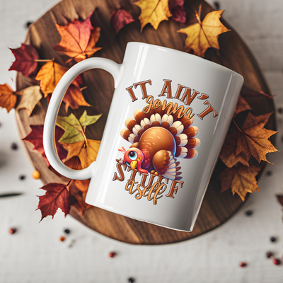 a white coffee mug with a turkey on it