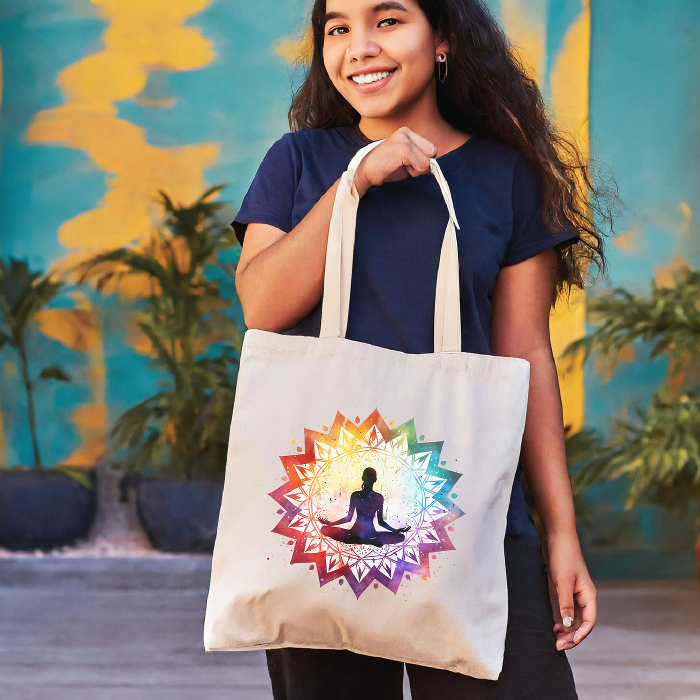 a woman holding a bag with a picture of a person on it