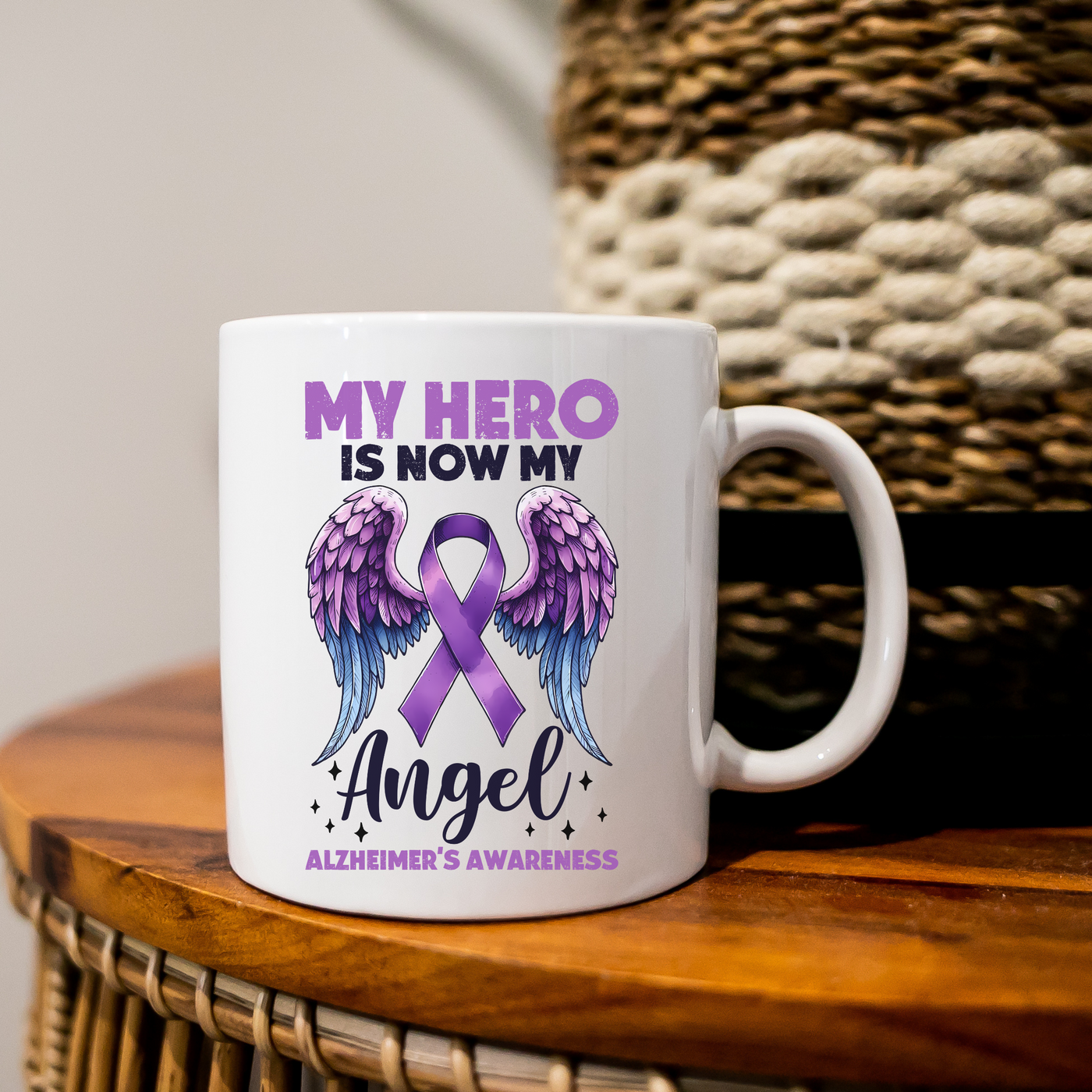 a white coffee mug with a purple ribbon on it