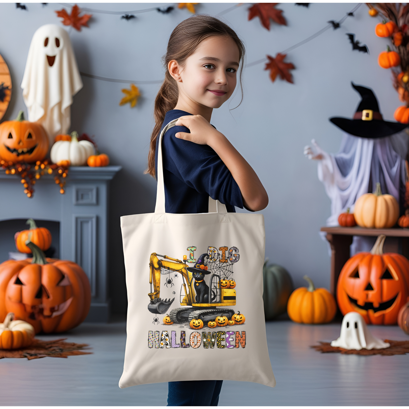 a little girl holding a trick or treat bag