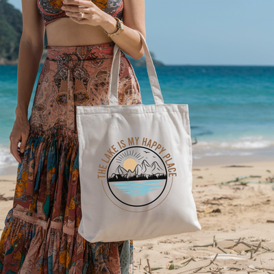 a woman standing on a beach holding a white bag