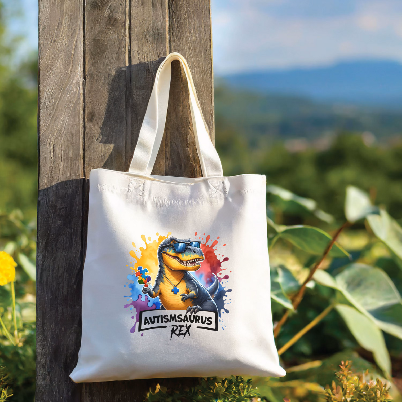 a tote bag hanging on a wooden pole