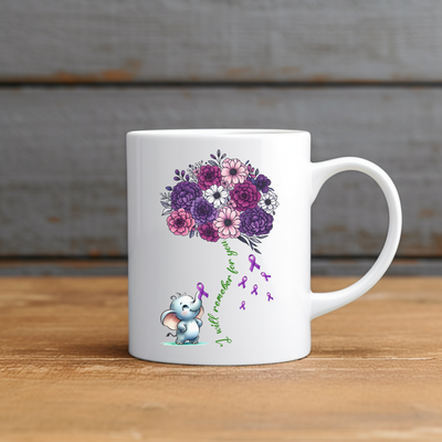 a white coffee mug with a bouquet of flowers on it