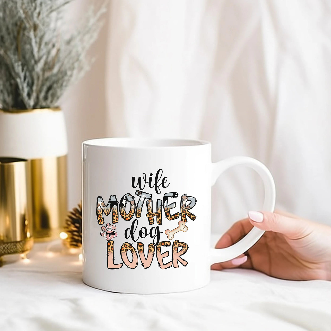 a woman holding a white coffee mug with the words we mother do lover on it