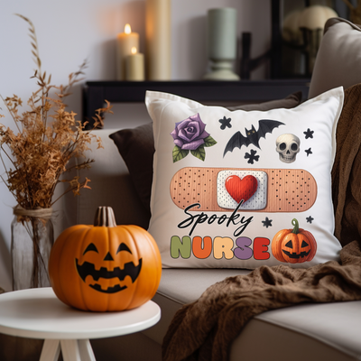 a couch with two pumpkins and a pillow on it