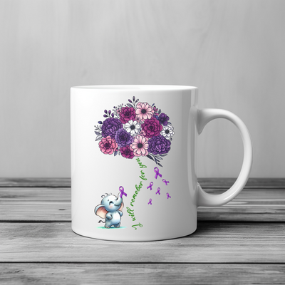 a white coffee mug with a bouquet of flowers on it