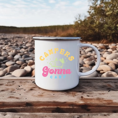 a campfire mug sitting on top of a wooden table