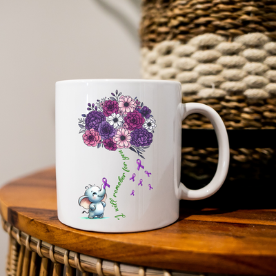 a white coffee mug with a bouquet of flowers on it