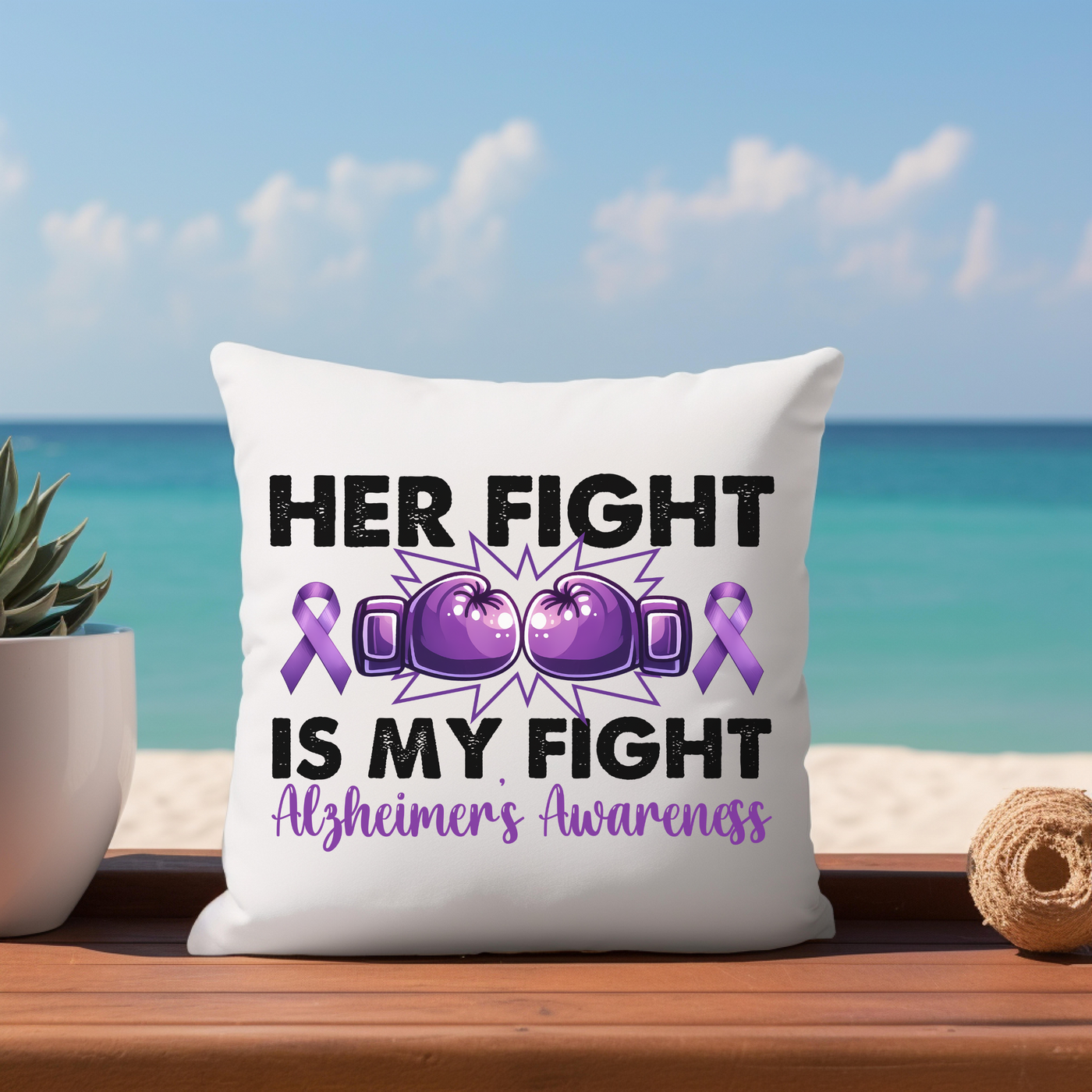 a pillow that has a picture of a pair of boxing gloves on it