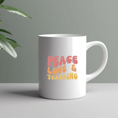 a white coffee mug with the words peace, love and teaching on it