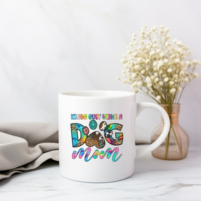 a white coffee mug with a dog on it