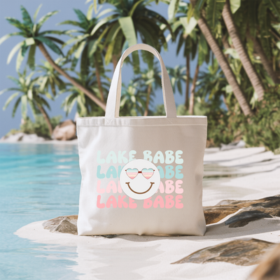 a white bag sitting on top of a sandy beach