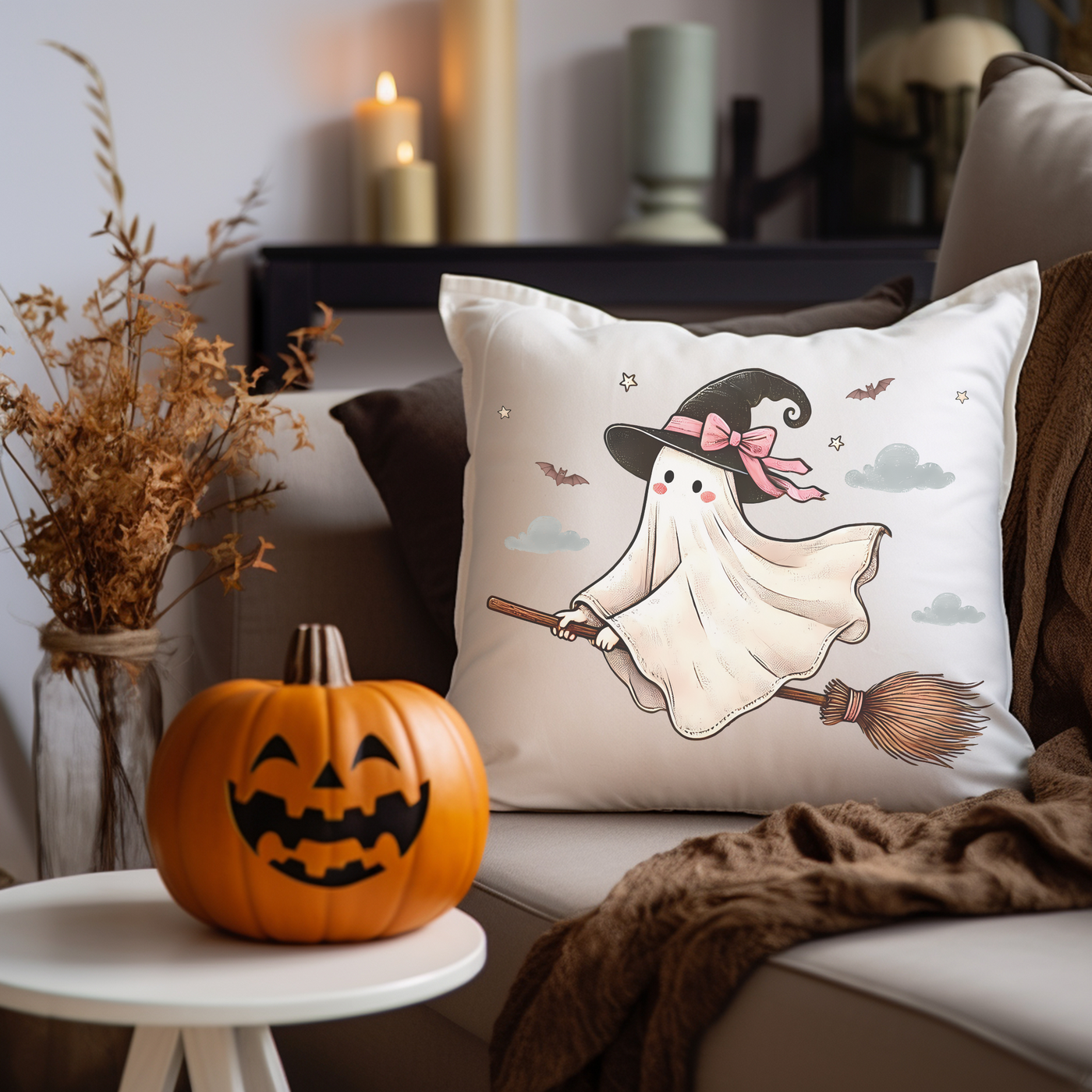 a pillow with a ghost on it sitting on a couch