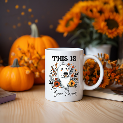 a white coffee mug sitting on top of a wooden table