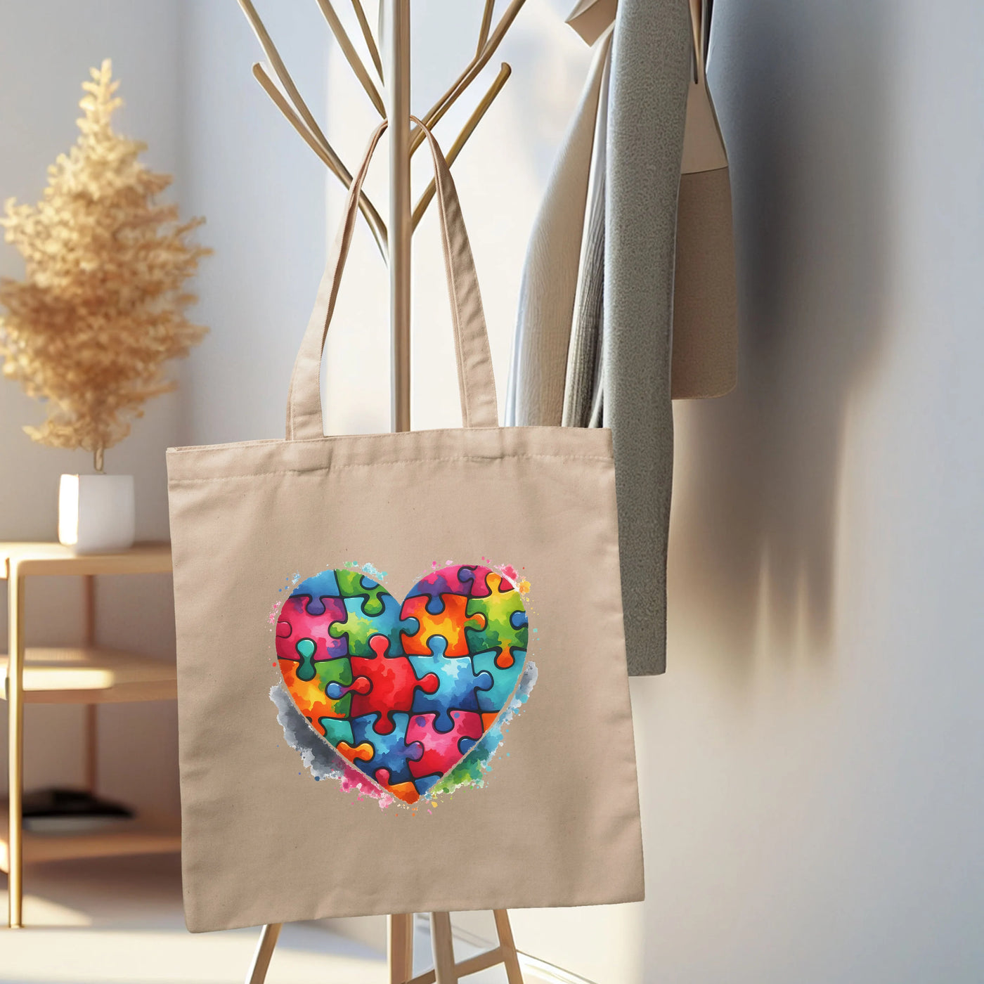 a tote bag with a heart made of puzzle pieces