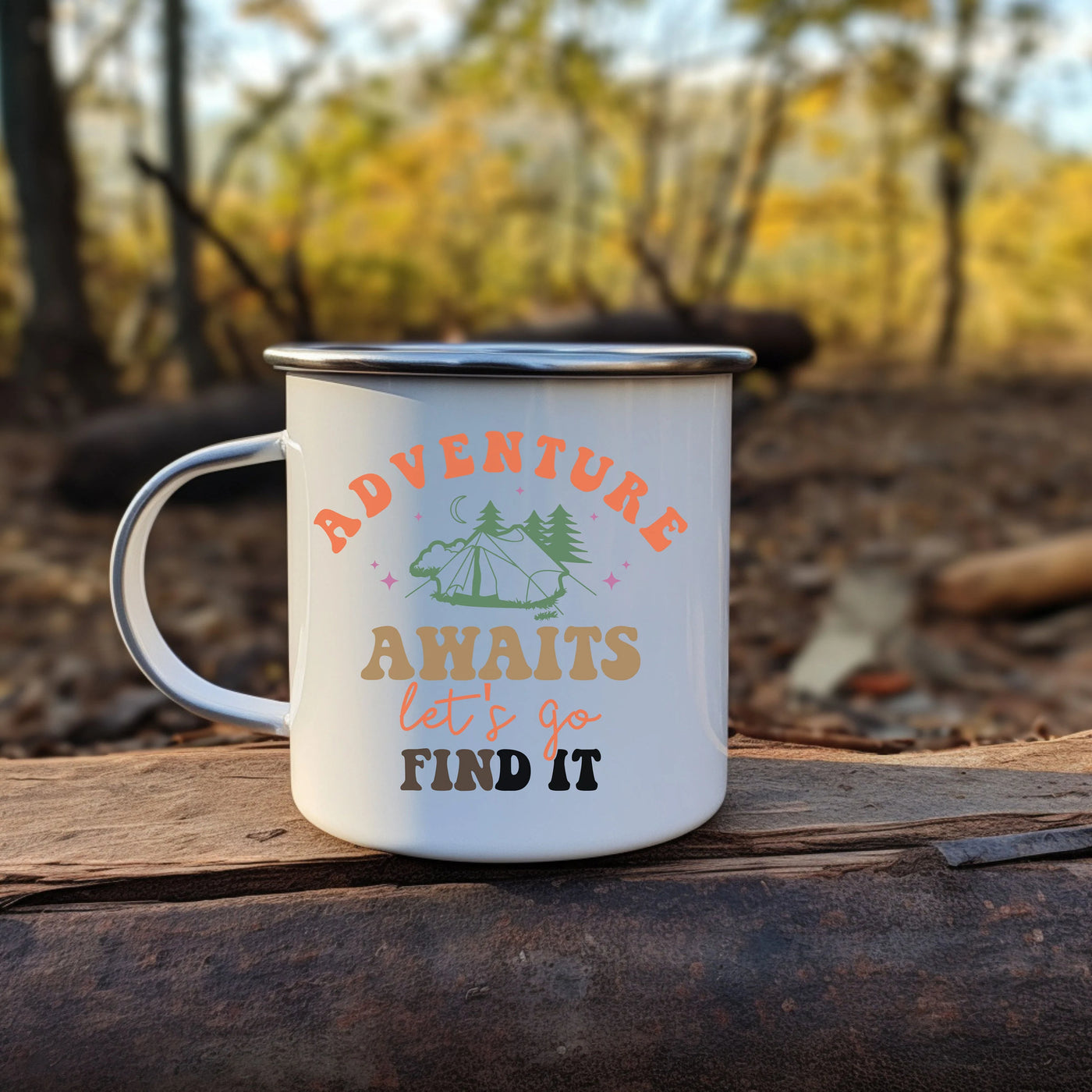 a camper mug sitting on top of a log