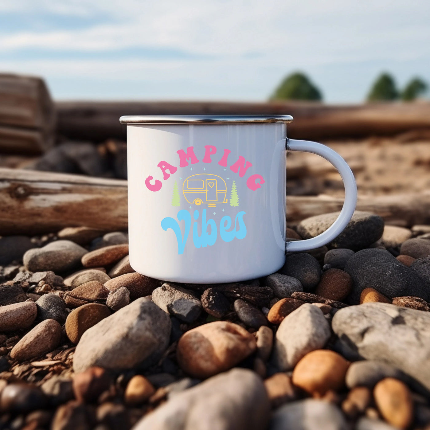 a white coffee mug sitting on top of a pile of rocks