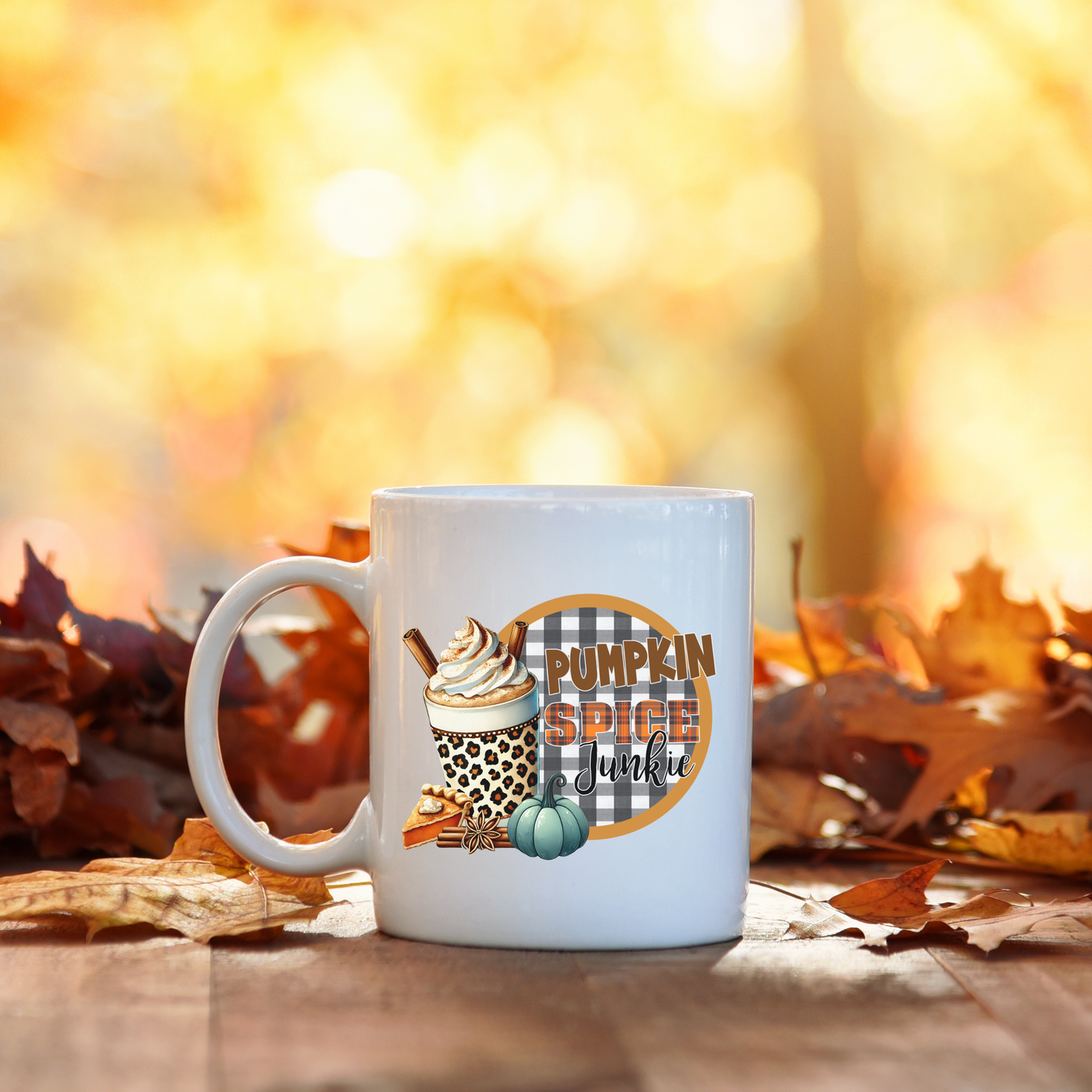 a cup of coffee sitting on top of a wooden table