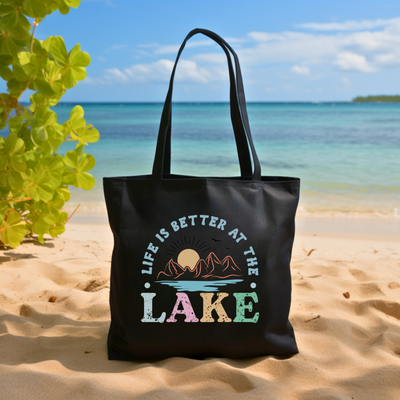 a black bag sitting on top of a sandy beach