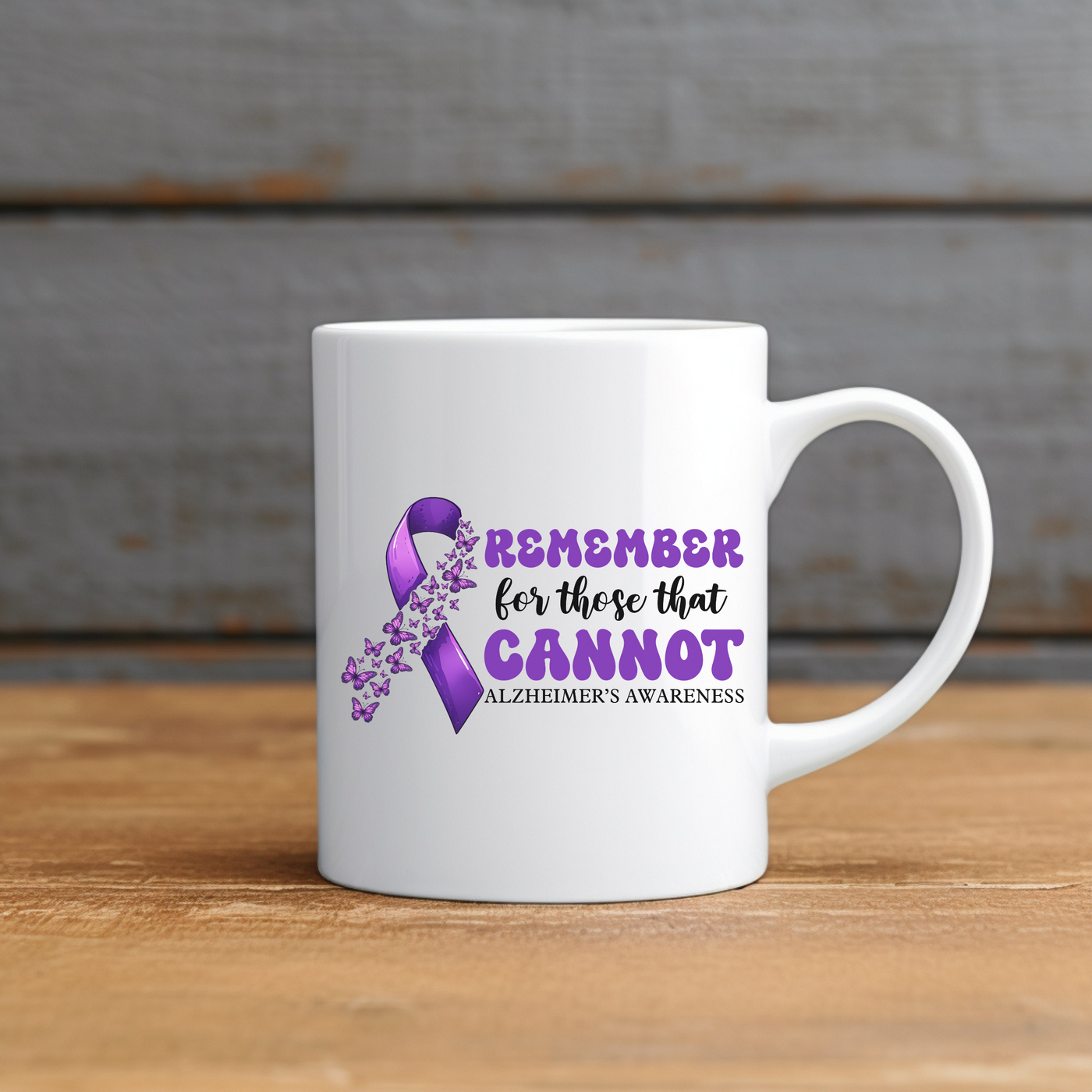 a white coffee mug with a purple ribbon on it