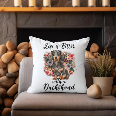 a white pillow with a black and brown dog on it