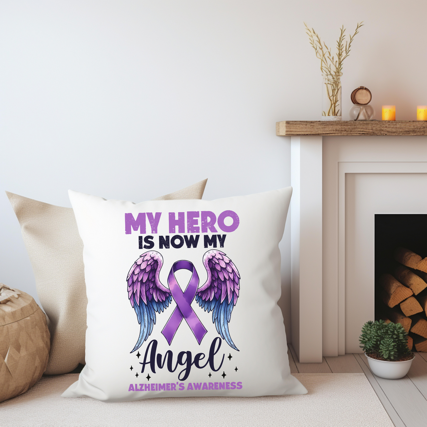 a pillow with a purple ribbon and angel wings on it