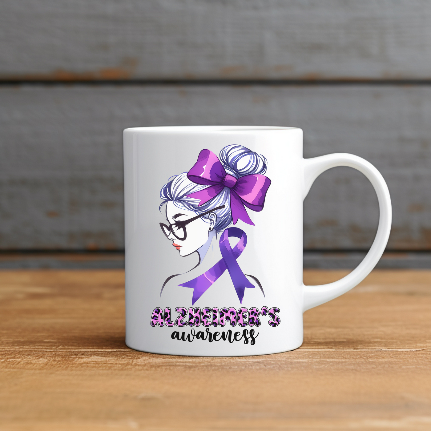 a white coffee mug with a purple ribbon on it