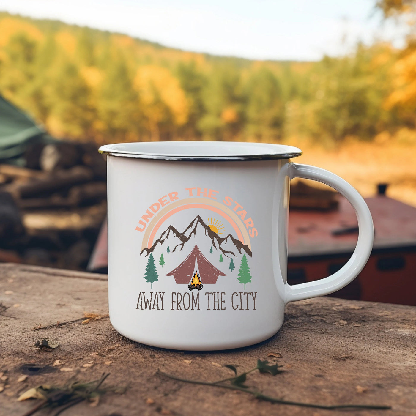 a camper's camp mug sitting on top of a log