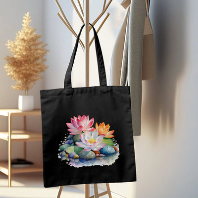 a black tote bag with a picture of a flower arrangement